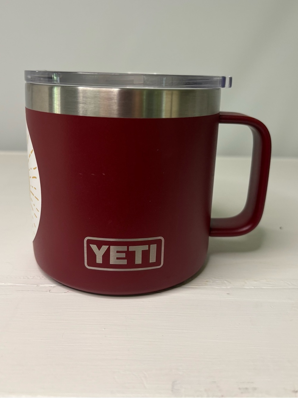 YETI Rambler 14 oz insulated mug with a You Are My Sunshine sticker.